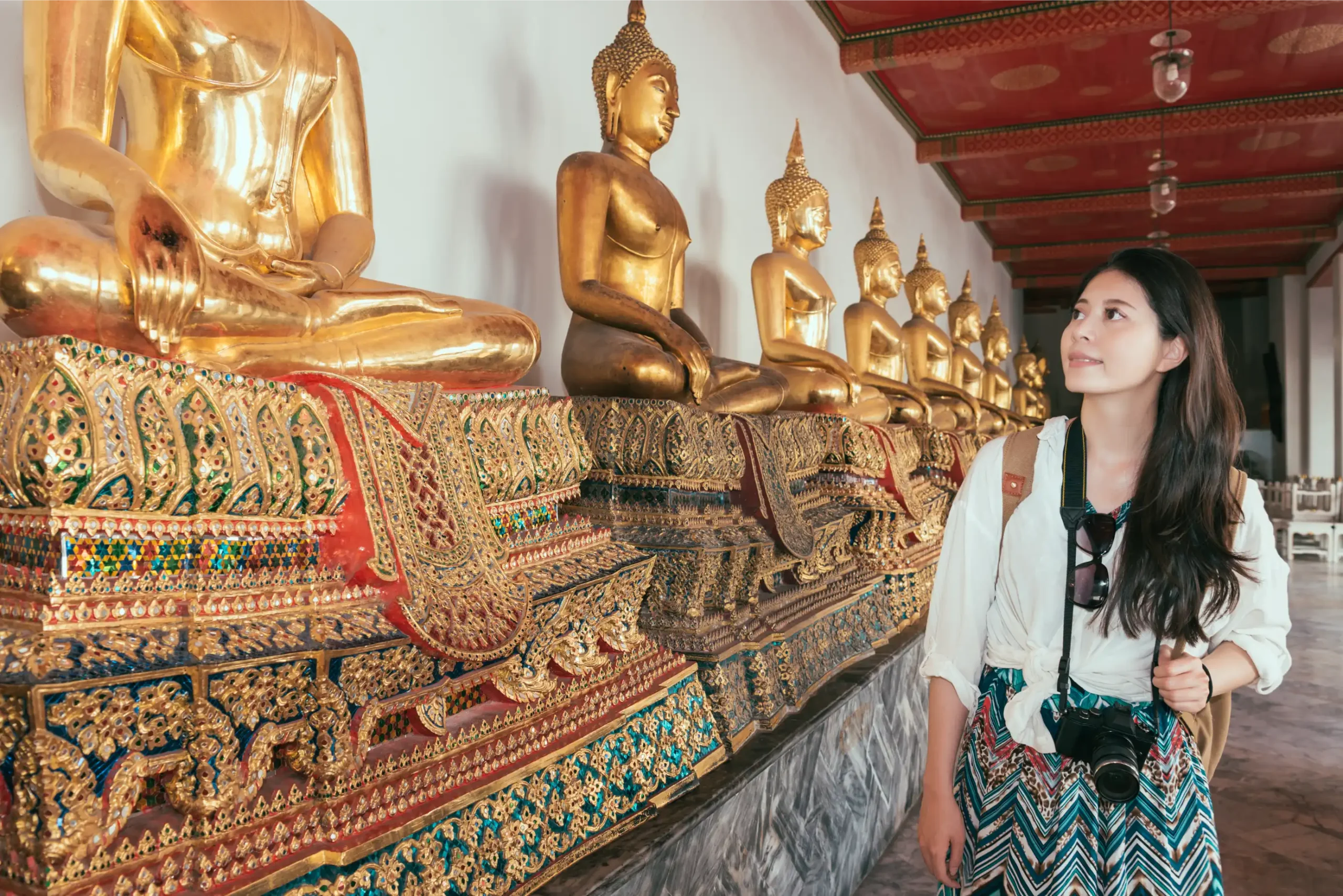 female-asian-tourist-seeing-golden-structure-ancient-temple-thailand