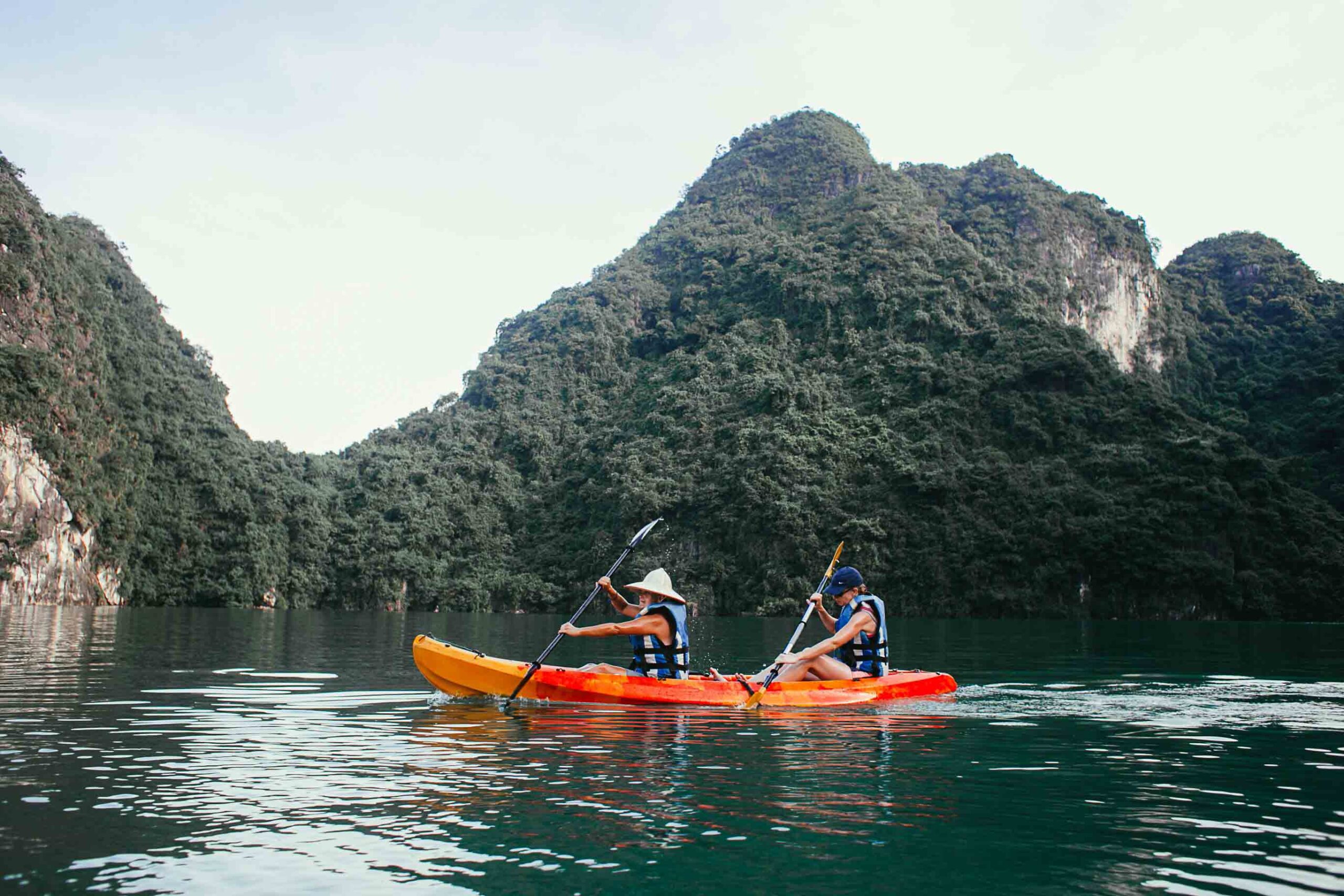 Morning Tai Chi, Kayaking & Flight to Da Nang